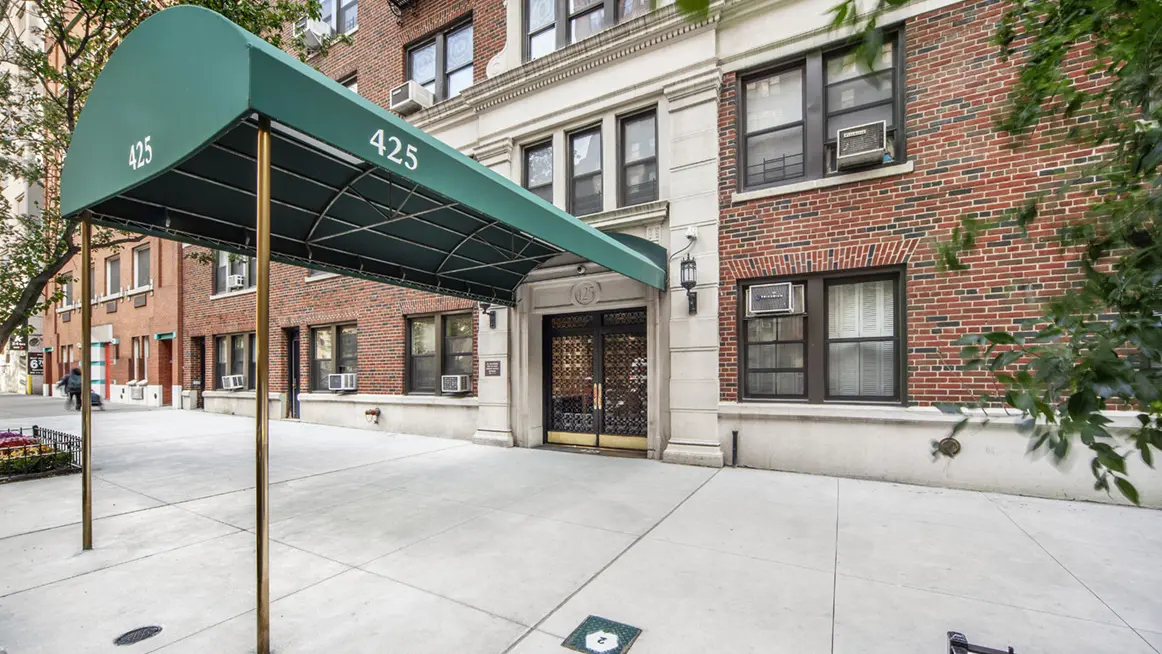 Urban office building with awning and entrance portico